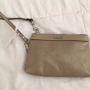 Wristlet with coach key chain